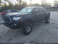 2018 Toyota Tacoma — photo 2 of 16 | VIN 5TFAZ5CN6JX067709