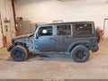 2016 Jeep Wrangler Unlimited — photo 14 of 16 | VIN 1C4BJWDG0GL171467