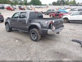2014 Toyota Tacoma — photo 3 of 19 | VIN 5TFJU4GN4EX064218