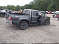 2014 Toyota Tacoma — photo 4 of 19 | VIN 5TFJU4GN4EX064218
