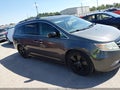 2011 Honda Odyssey — photo 13 of 16 | VIN 5FNRL5H94BB087159
