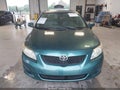 2009 Toyota Corolla — photo 12 of 16 | VIN JTDBL40E49J052323