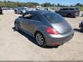2014 Volkswagen Beetle — photo 3 of 11 | VIN 3VWRL7AT1EM638937