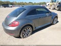 2014 Volkswagen Beetle — photo 4 of 11 | VIN 3VWRL7AT1EM638937