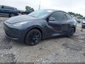 2024 Tesla Model Y — photo 2 of 18 | VIN 7SAYGDEE3RA277833