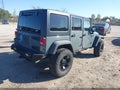 2014 Jeep Wrangler Unlimited — photo 4 of 16 | VIN 1C4BJWDG4EL307029