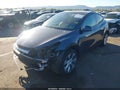 2023 Tesla Model Y — photo 2 of 19 | VIN 7SAYGDEE9PA119168