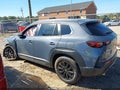 2024 Mazda CX-50 — photo 13 of 15 | VIN 7MMVABAM5RN230178