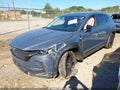 2024 Mazda CX-50 — photo 2 of 15 | VIN 7MMVABAM5RN230178