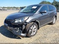 2014 Honda CR-V — photo 2 of 17 | VIN 5J6RM4H56EL053823