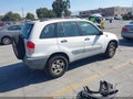 2001 Toyota RAV4 — photo 4 of 11 | VIN JTEGH20VX10023099