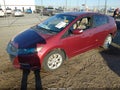 2010 Honda Insight — photo 2 of 18 | VIN JHMZE2H73AS042270