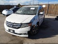 2014 Honda Odyssey — photo 2 of 16 | VIN 5FNRL5H91EB132689