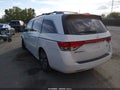 2014 Honda Odyssey — photo 3 of 16 | VIN 5FNRL5H91EB132689