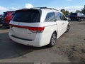 2014 Honda Odyssey — photo 4 of 16 | VIN 5FNRL5H91EB132689