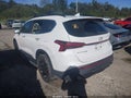 2022 Hyundai Santa Fe — photo 3 of 16 | VIN 5NMS64AJ0NH390806