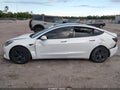 2021 Tesla Model 3 — photo 12 of 14 | VIN 5YJ3E1EAXMF094434