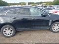 2014 Cadillac SRX — photo 12 of 16 | VIN 3GYFNEE35ES523178