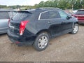 2014 Cadillac SRX — photo 4 of 16 | VIN 3GYFNEE35ES523178