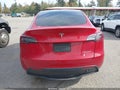 2022 Tesla Model Y — photo 15 of 17 | VIN 7SAYGDEE8NF548298