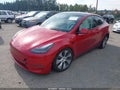 2022 Tesla Model Y — photo 2 of 17 | VIN 7SAYGDEE8NF548298