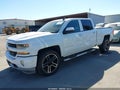 2018 Chevrolet Silverado 1500 — photo 2 of 16 | VIN 1GCUKREC7JF153122