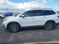 2021 Honda Pilot — photo 14 of 16 | VIN 5FNYF5H94MB029770