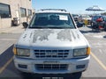 1999 Isuzu Rodeo — photo 12 of 16 | VIN 4S2CK58WXX4373924