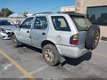 1999 Isuzu Rodeo — photo 3 of 16 | VIN 4S2CK58WXX4373924