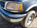 2001 Ford F-150 — photo 13 of 14 | VIN 1FTRX18L31NA37491