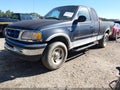 2001 Ford F-150 — photo 2 of 14 | VIN 1FTRX18L31NA37491