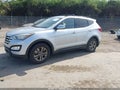 2014 Hyundai Santa Fe — photo 2 of 11 | VIN 5XYZUDLB2EG159958