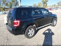 2009 Ford Escape — photo 4 of 11 | VIN 1FMCU03789KB20684