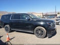 2015 Chevrolet Suburban 1500 — photo 13 of 16 | VIN 1GNSKKKC0FR725731