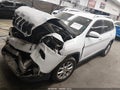 2014 Jeep Cherokee — photo 2 of 15 | VIN 1C4PJLCB8EW247720