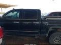 2015 GMC Sierra 1500 — photo 13 of 15 | VIN 3GTU2VEJ3FG412069