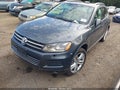 2013 Volkswagen Touareg — photo 2 of 16 | VIN WVGEF9BP7DD001532