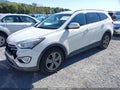 2014 Hyundai Santa Fe — photo 2 of 17 | VIN KM8SMDHFXEU087107