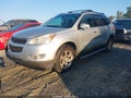 2011 Chevrolet Traverse — photo 2 of 13 | VIN 1GNKRGED1BJ319060
