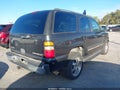 2004 Chevrolet Tahoe — photo 4 of 11 | VIN 1GNEC13Z94R312386