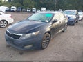 2012 Kia Optima — photo 2 of 10 | VIN 5XXGN4A77CG079625