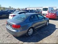 2014 Volkswagen Jetta — photo 4 of 11 | VIN 3VWD07AJ6EM275729