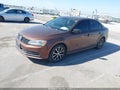 2016 Volkswagen Jetta — photo 2 of 12 | VIN 3VWD67AJ3GM363008