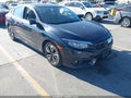 2017 Honda Civic — photo 12 of 17 | VIN 19XFC1F36HE210534