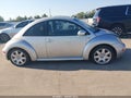 2001 Volkswagen Beetle — photo 12 of 15 | VIN 3VVDD21C71M472203