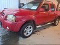 2003 Nissan Frontier — photo 2 of 12 | VIN 1N6MD27Y03C431449