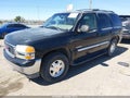 2001 GMC Yukon — photo 2 of 11 | VIN 1GKEK13T91R186974