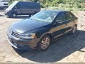 2016 Volkswagen Jetta — photo 2 of 12 | VIN 3VWD67AJ6GM354464
