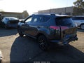 2018 Toyota RAV4 — photo 3 of 17 | VIN 2T3JFREV9JW838245