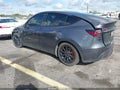 2023 Tesla Model Y — photo 3 of 15 | VIN 7SAYGDEFXPF919182